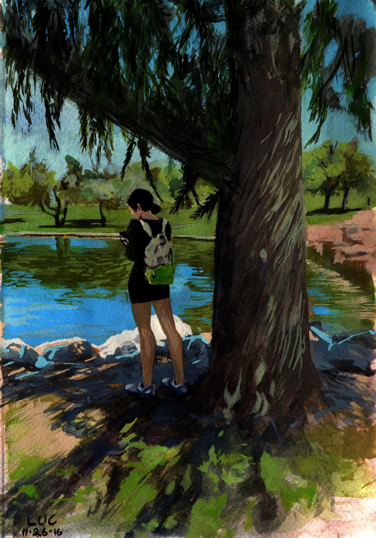 Landscape of a lakeside on a sunny day with woman standing in the shadows under a tree in the foreground
